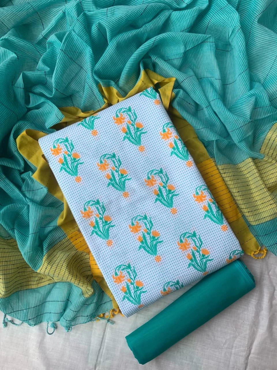 Unstitched Slub cotton three-piece.